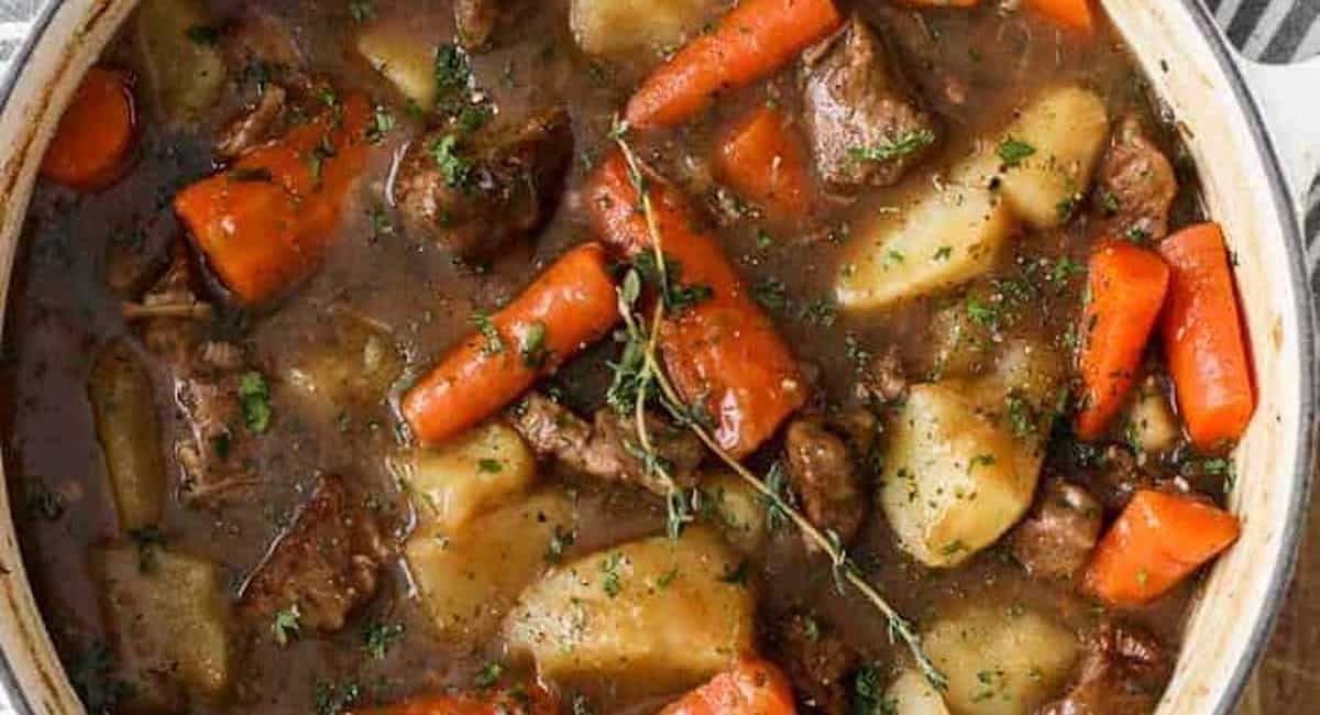 Overhead image of lamb stew with garnish.