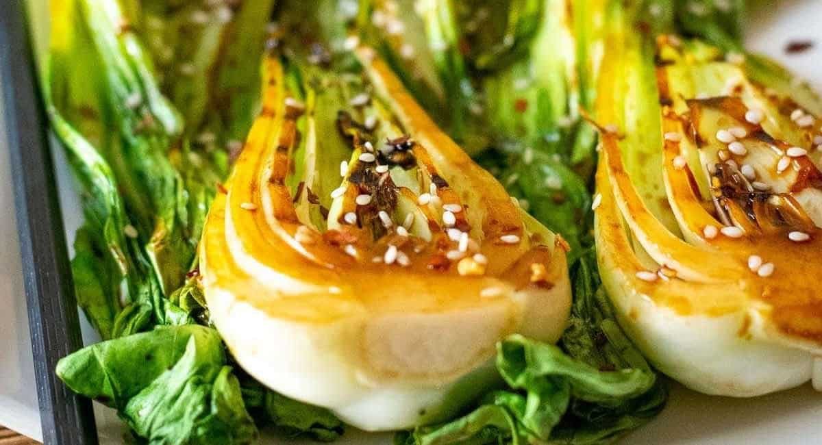 Up close image of charred pak choi.