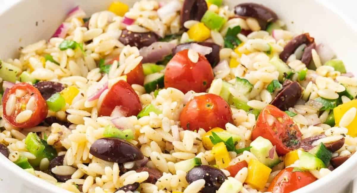 Up close image of orzo pasta salad with honey dijon dressing.