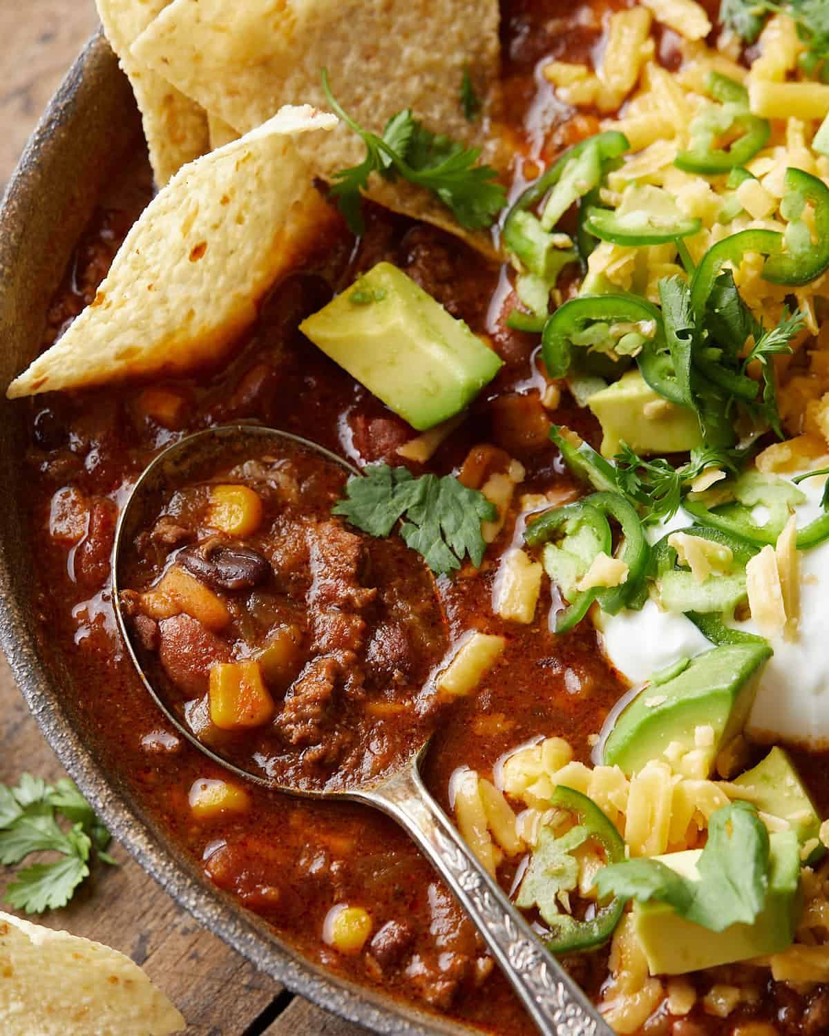 Up close image of 7-can taco soup with garnish.