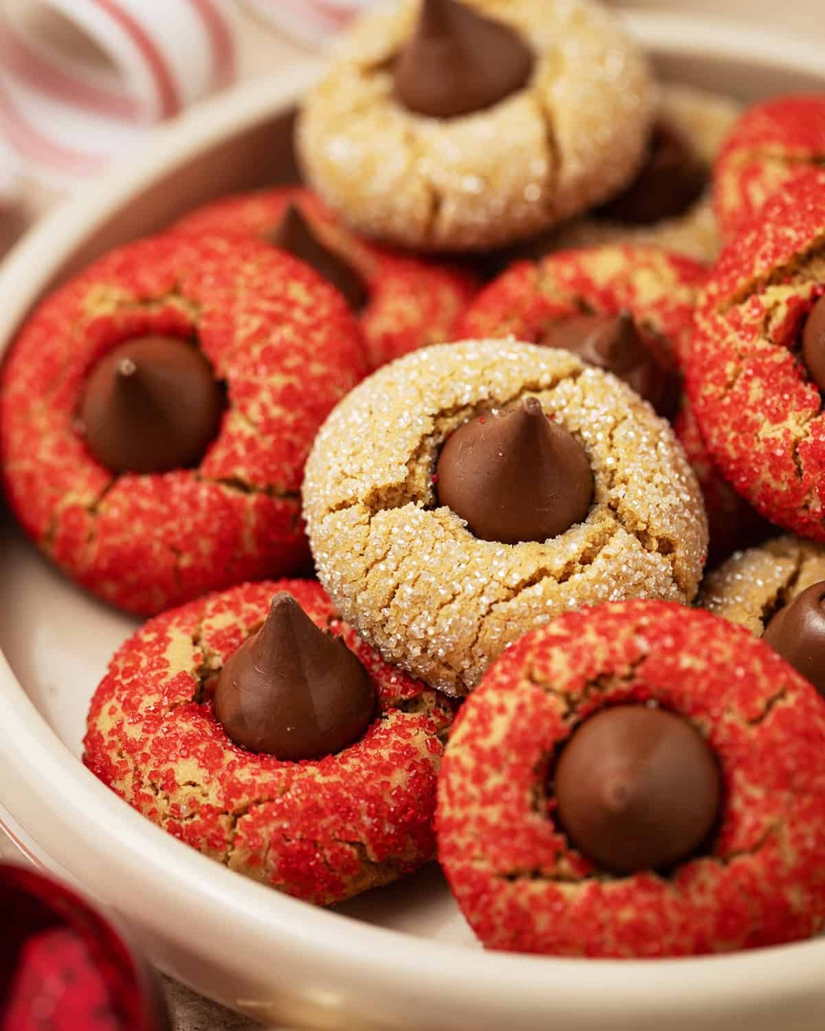 Up close image of Christmas peanut butter blossoms.
