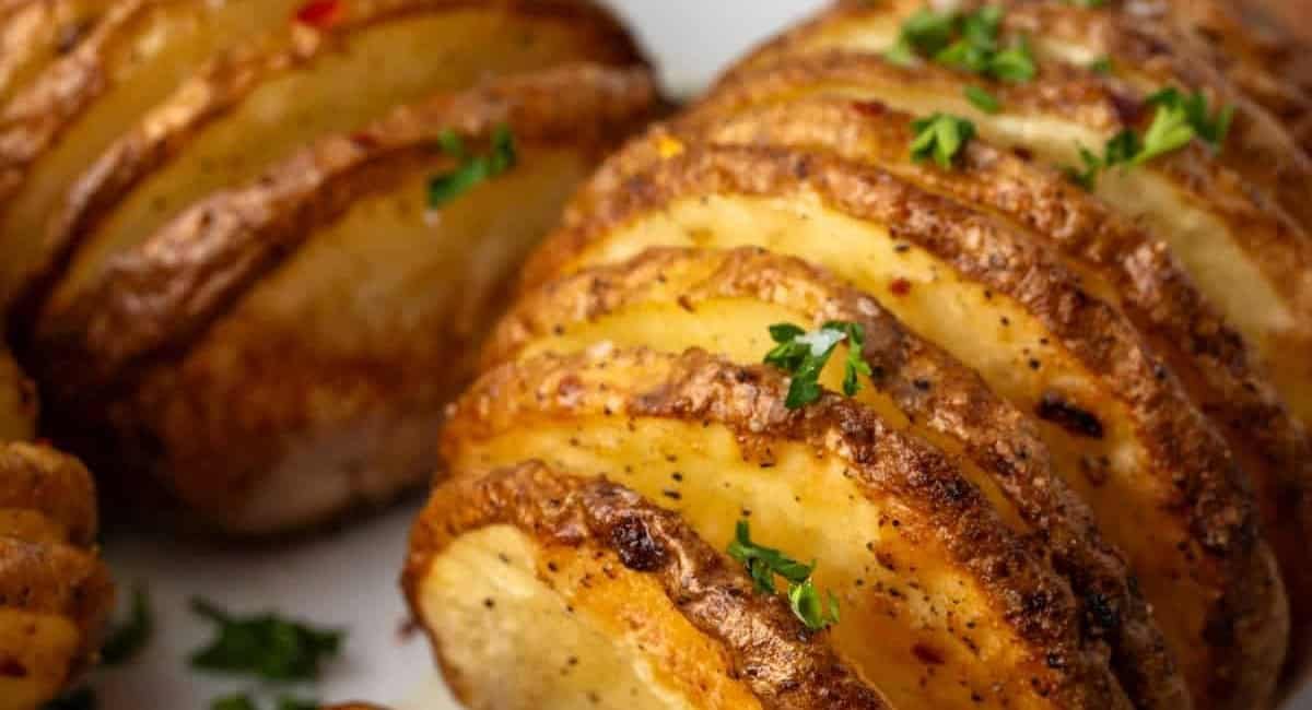 Up close image of air fryer hasselback potatoes.