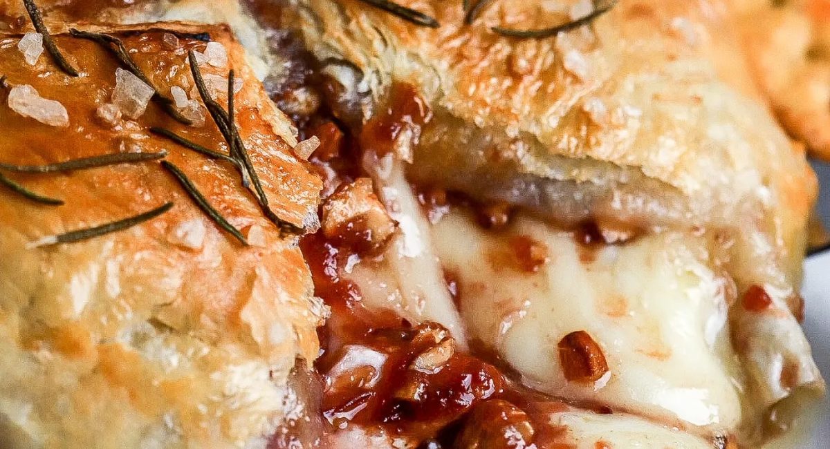 Up close image of air fryer baked brie with puff pastry.
