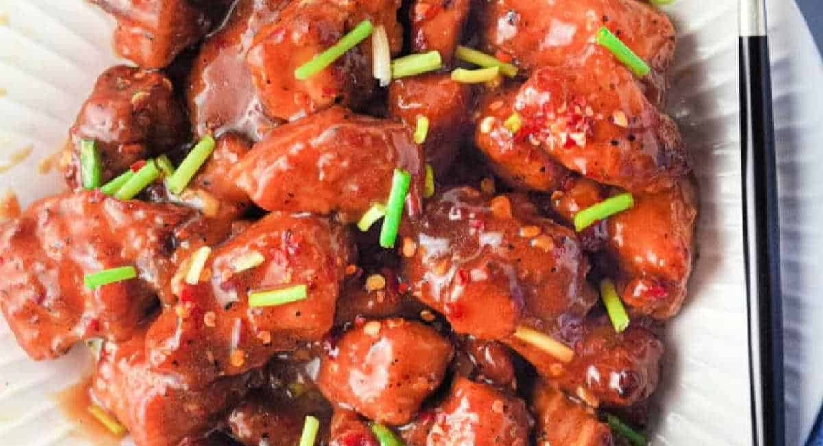 Overhead image of air fryer sesame chicken.