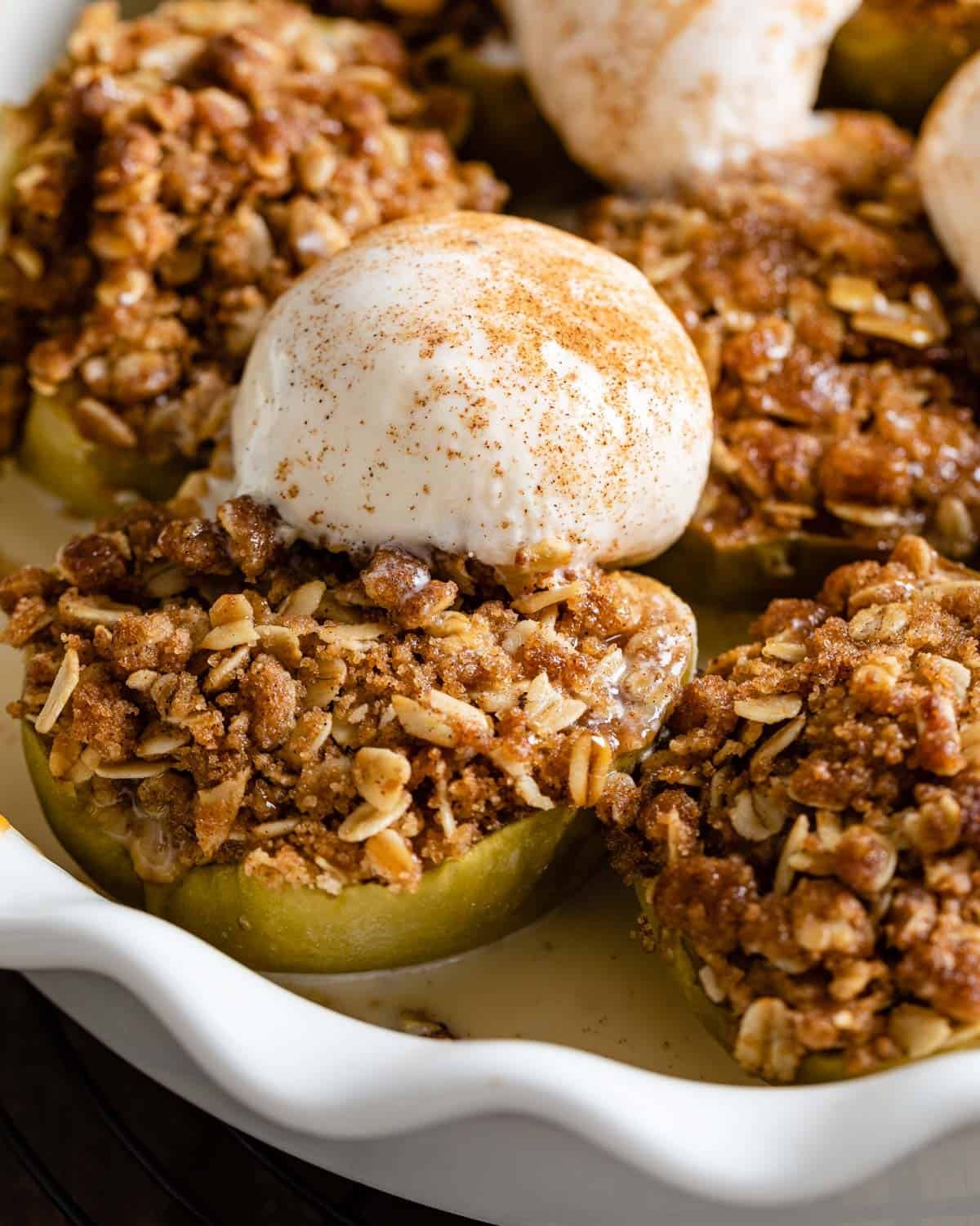 Up close image of air fryer apples with ice cream.