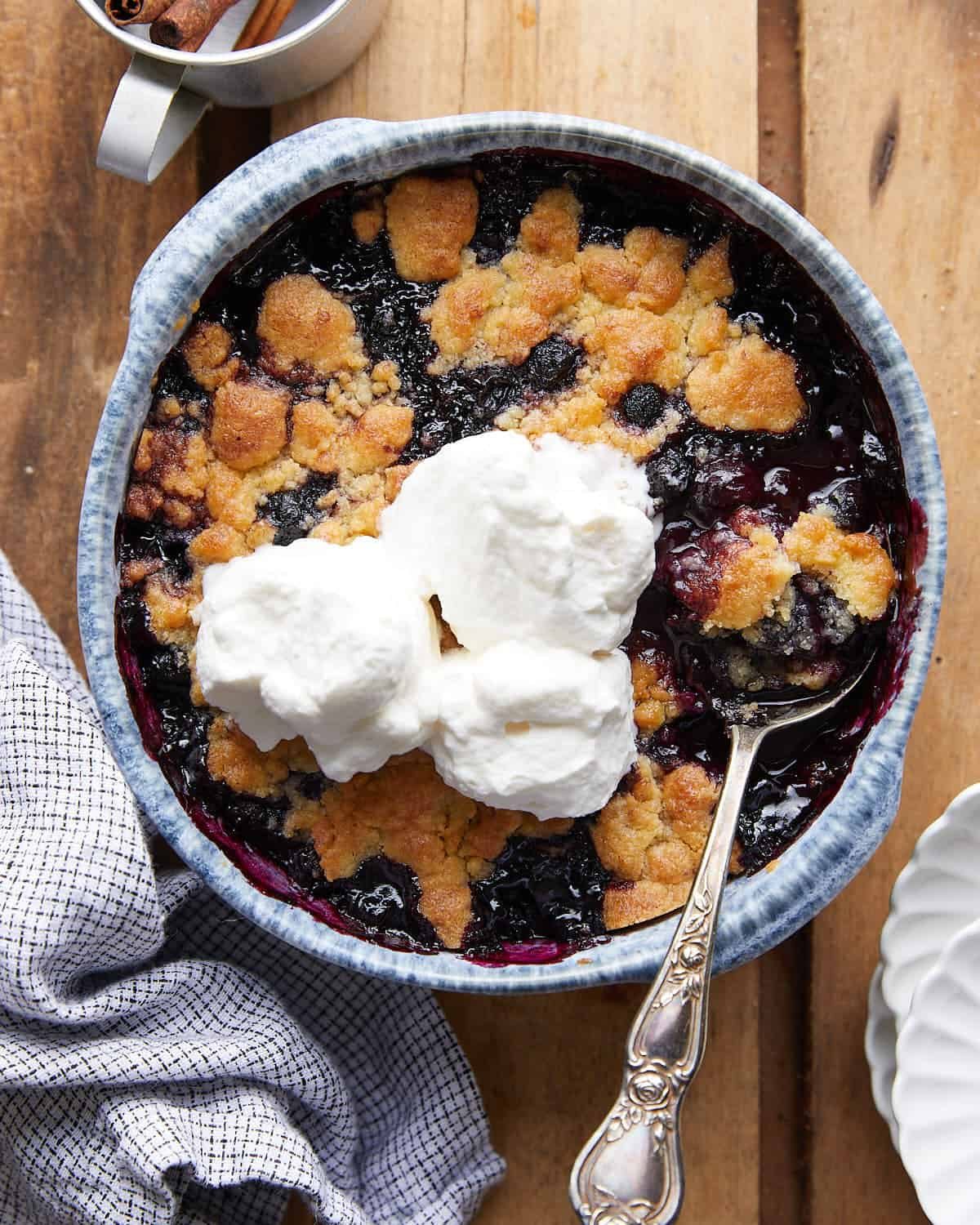 Overhead image of air fryer blueberry cobbler.