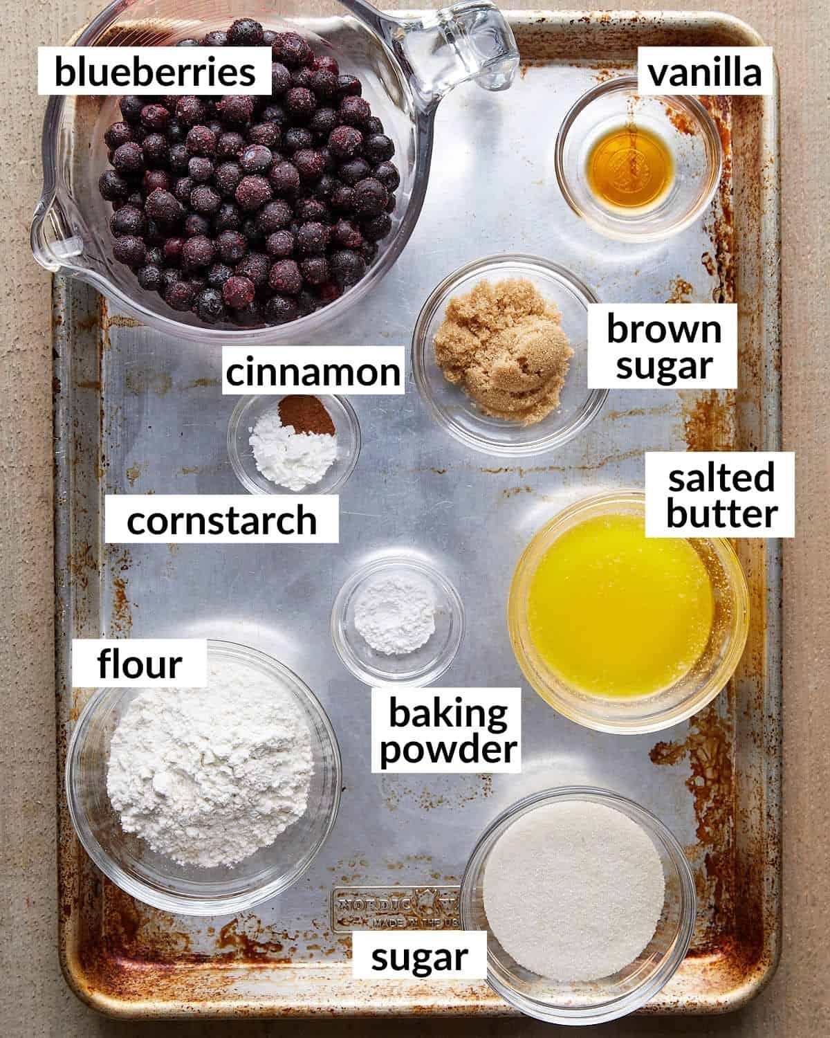 Overhead ingredients needed to make air fryer blueberry cobbler.