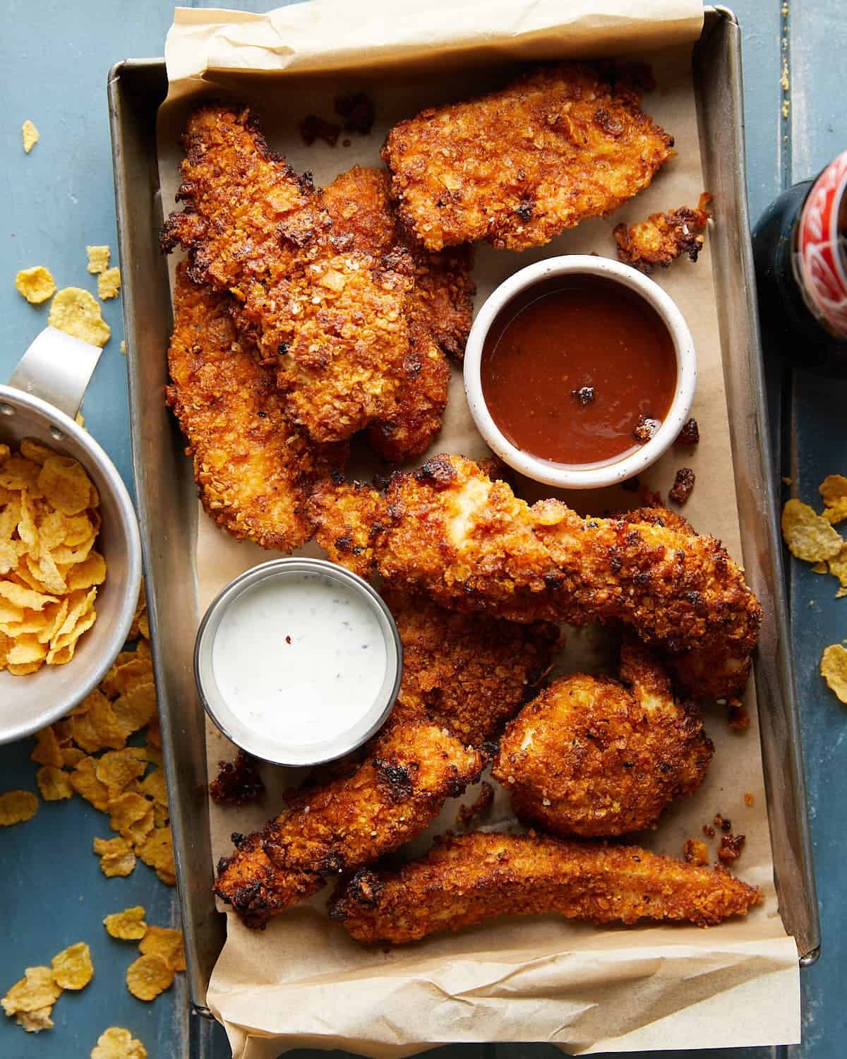 Overhead image of air fryer cornflake chicken.