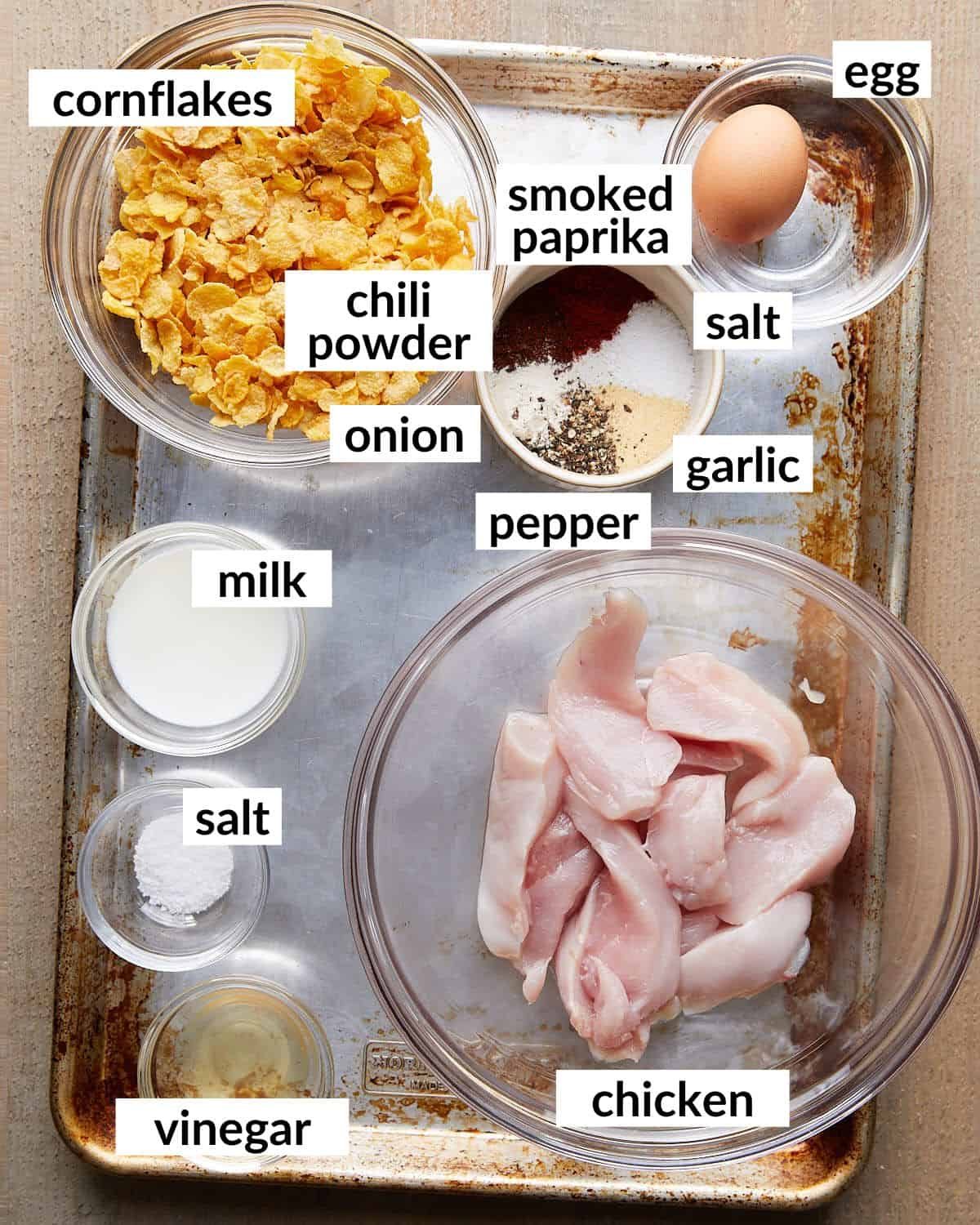 Overhead image of ingredients needed to make air fryer cornflake chicken.