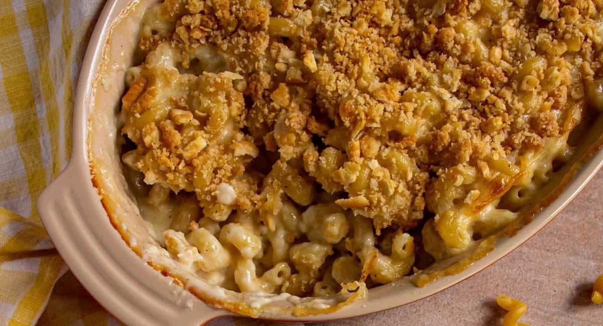 Overhead image of American baked mac and cheese with ritz crackers.