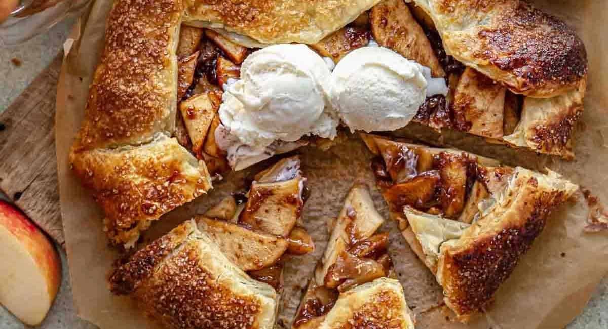 Overhead image of apple galette with puff pastry and ice cream topping.