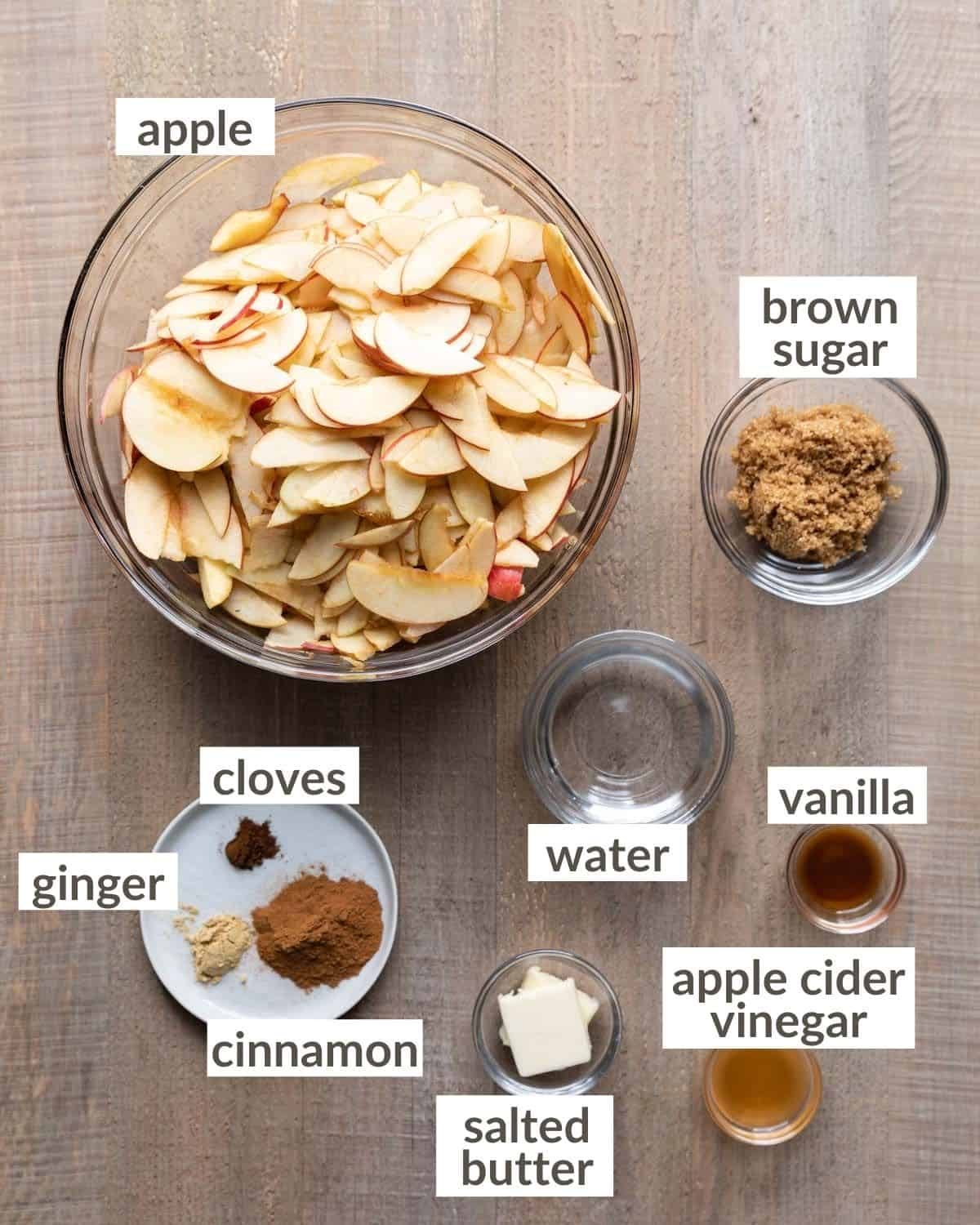 All of the ingredients needed to make apple curd in glass prep bowls.