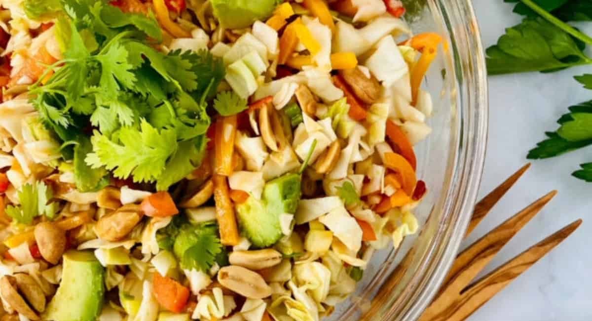 Overhead image of Asian avocado peanut coleslaw.