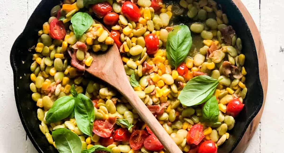 Overhead image of bacon succotash.