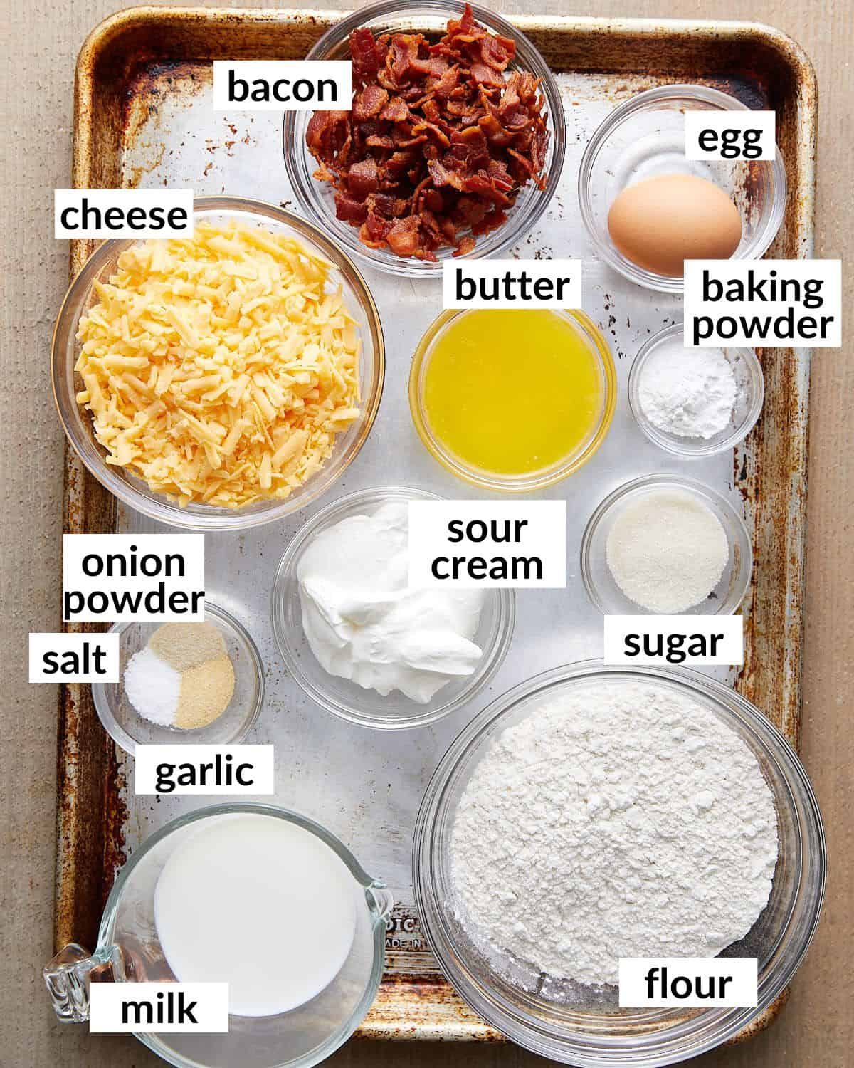Overhead image of ingredients needed for bacon and cheddar cheese muffins.