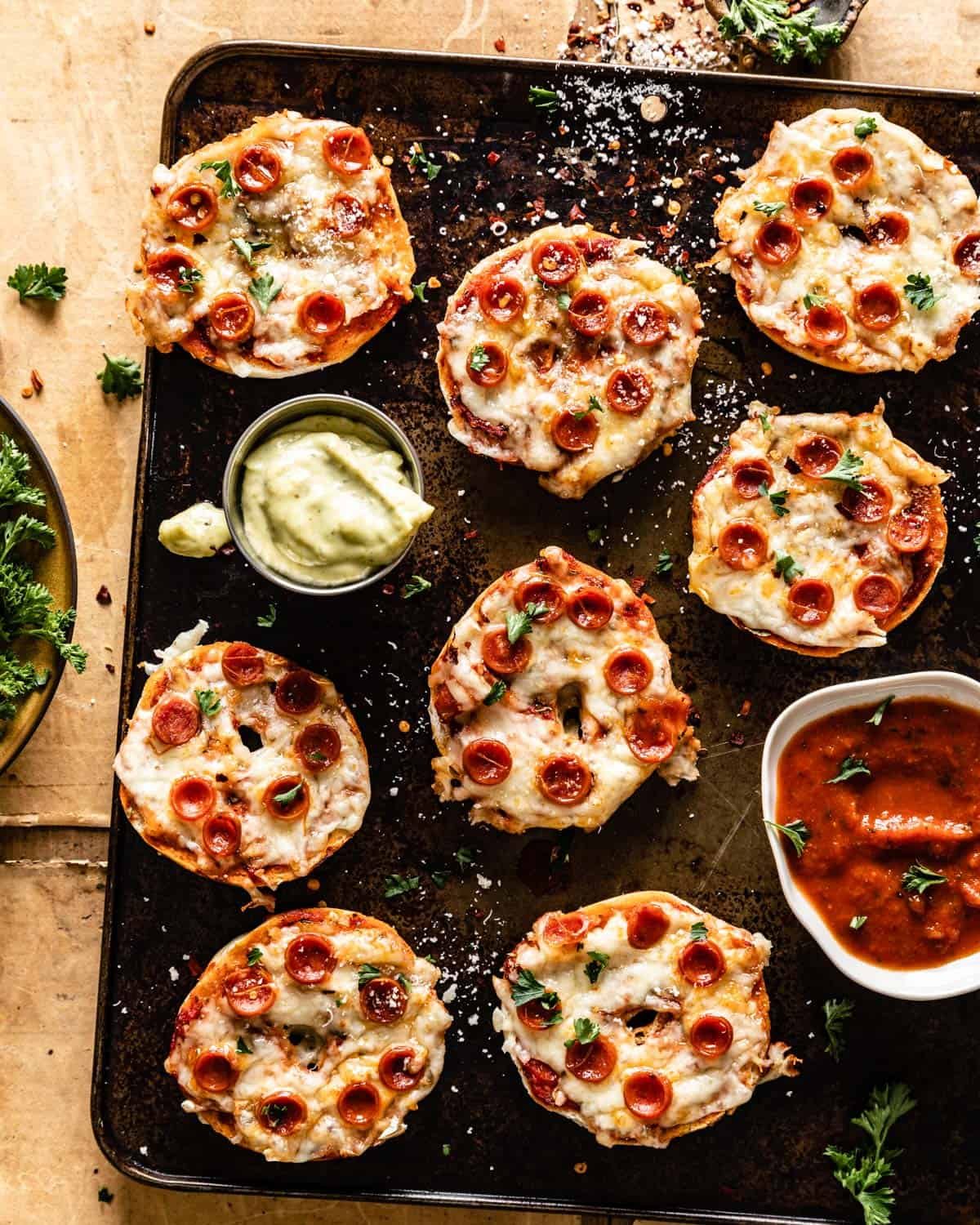 overhead shots of air fryer bagel bites on baking sheet