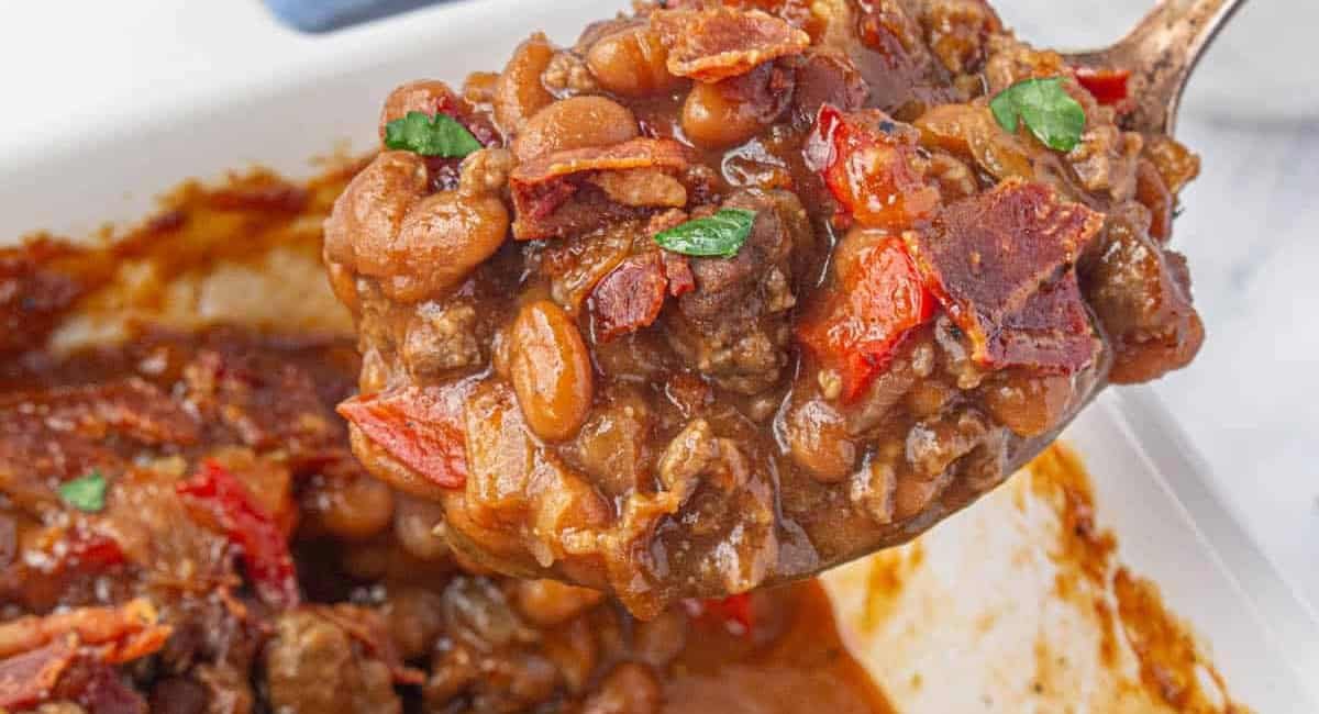 Up close image of baked bean casserole.