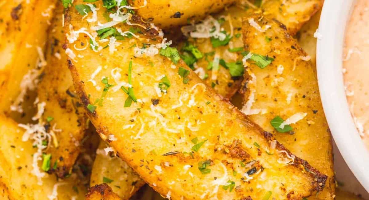 Up close image of oven baked potato wedges.