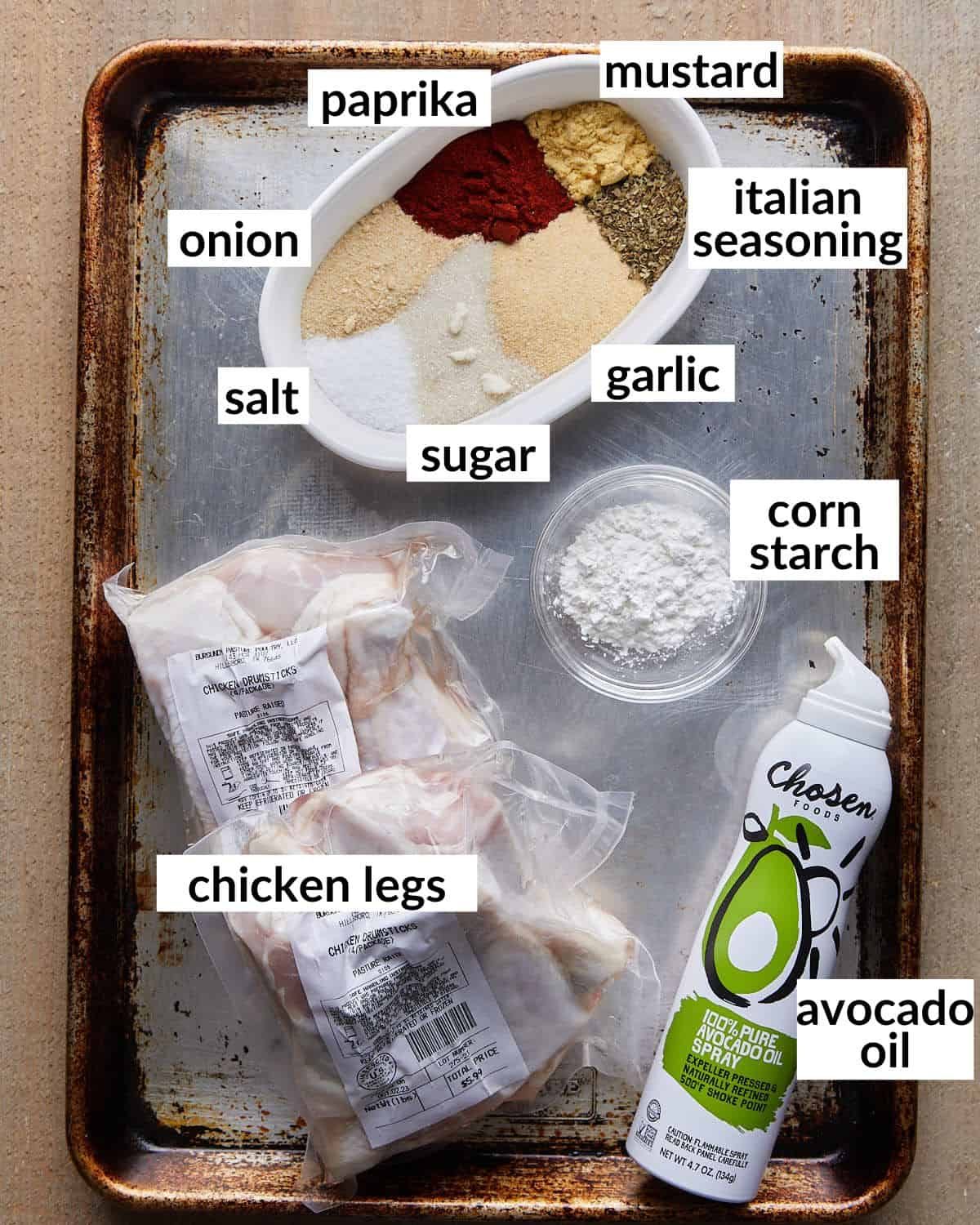 Overhead image of ingredients needed for baked chicken legs.