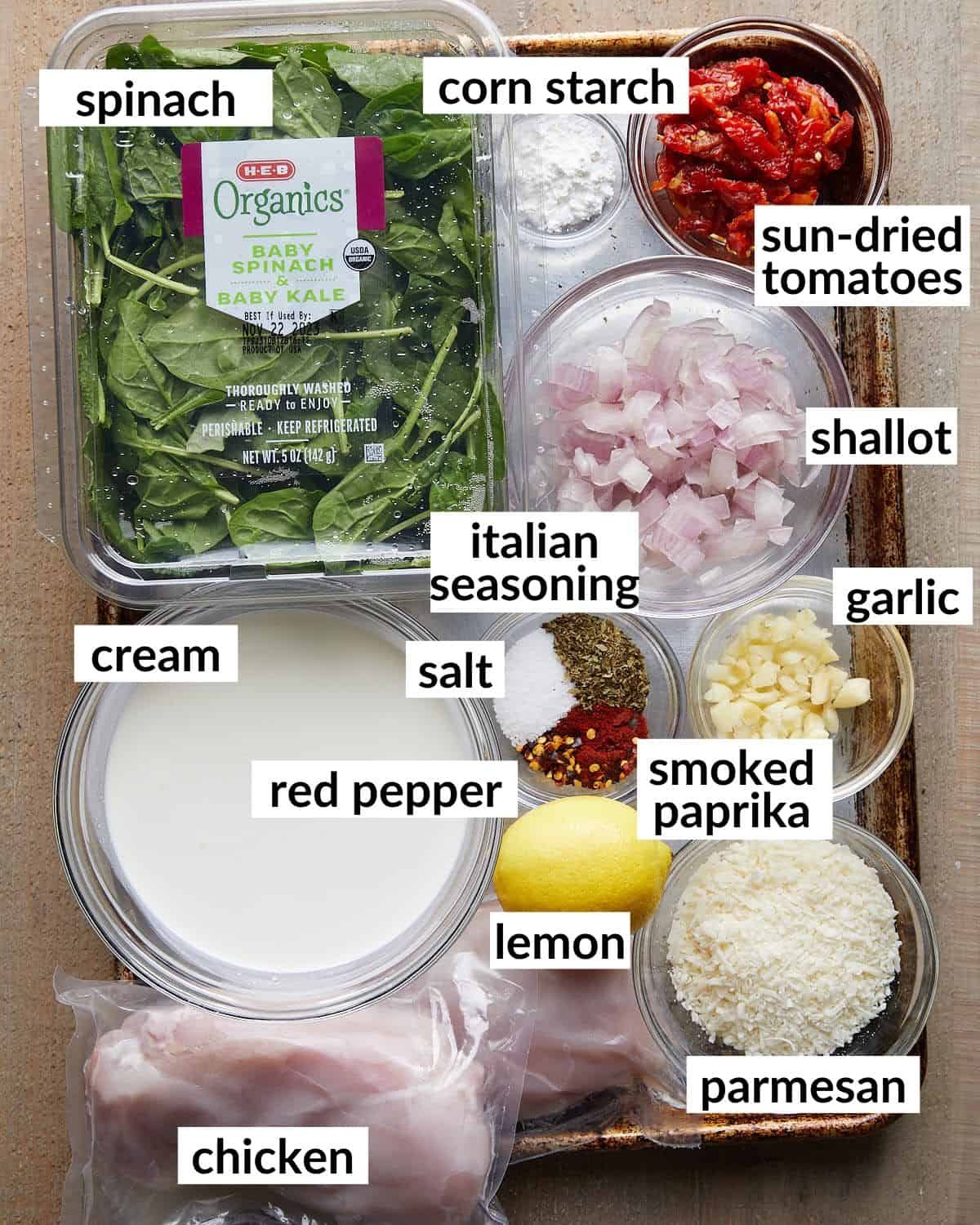 Overhead image of ingredients needed to make tuscan chicken.
