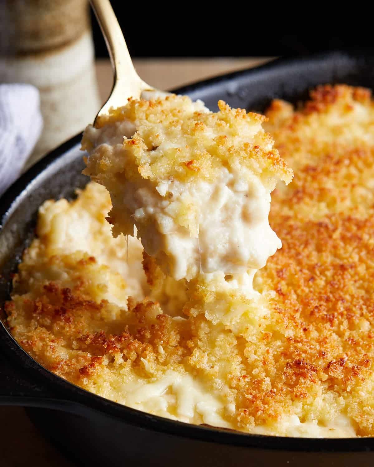 Up close image of baked white cheddar mac and cheese.