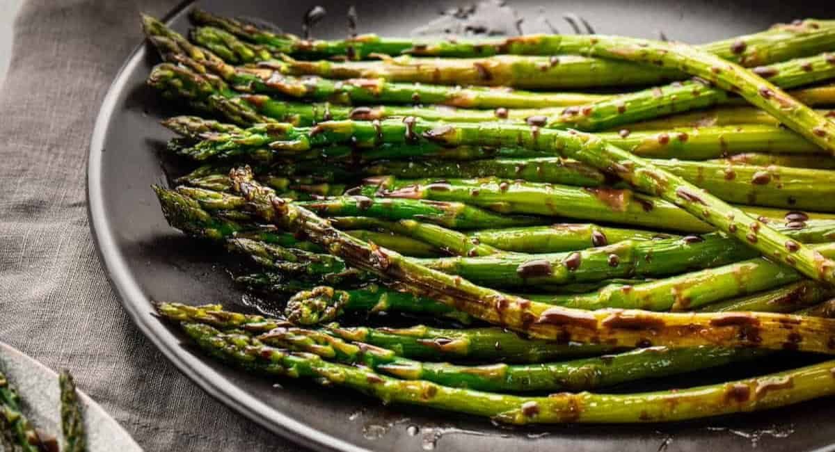 Up close image of balsamic asparagus.