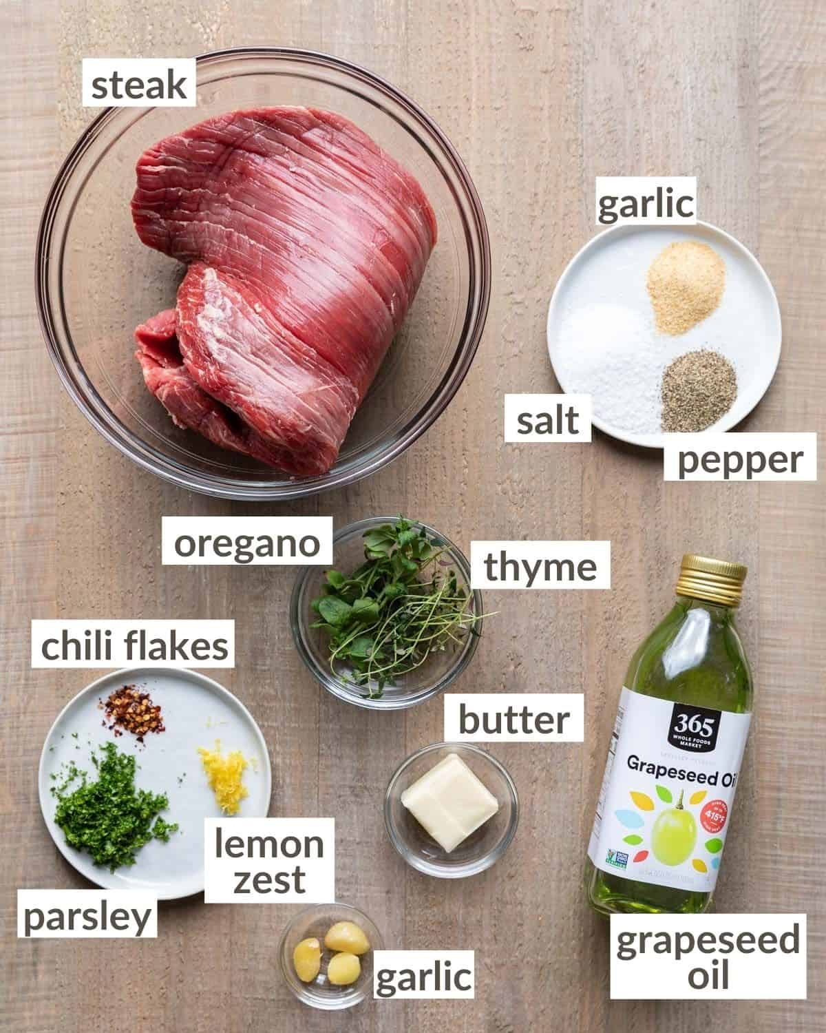 Overhead image of ingredients needed to make cast iron flank steak.
