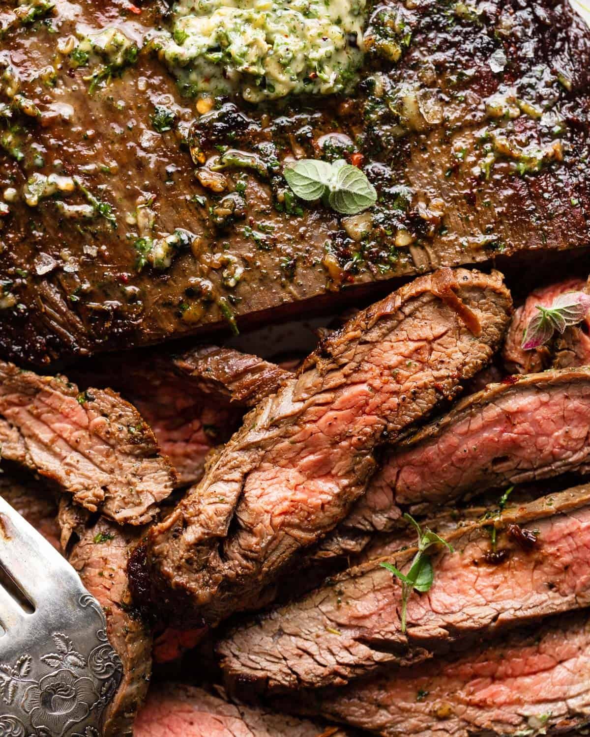 An up close image of cast iron flank steaks.