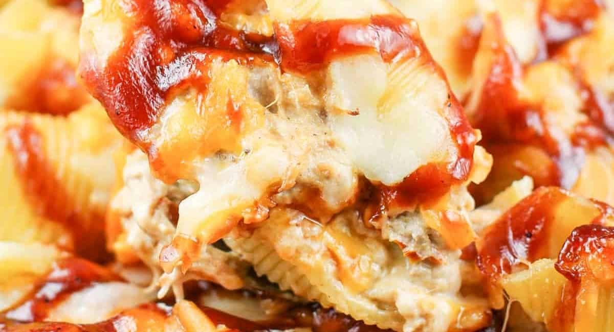 Up close image of bbq pulled pork stuffed shells.