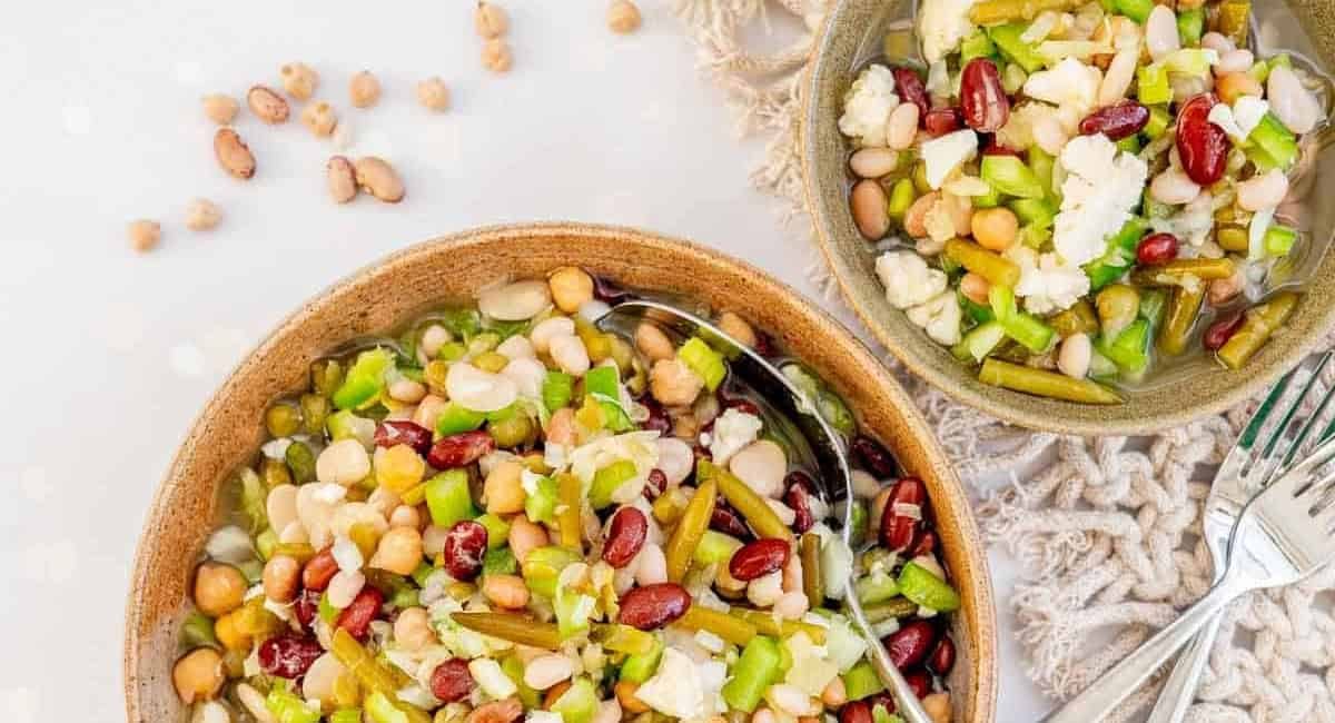 Overhead image of mixed bean salad in two bowls.