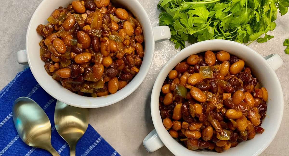 Overhead image of baked beans recipe with pancetta.
