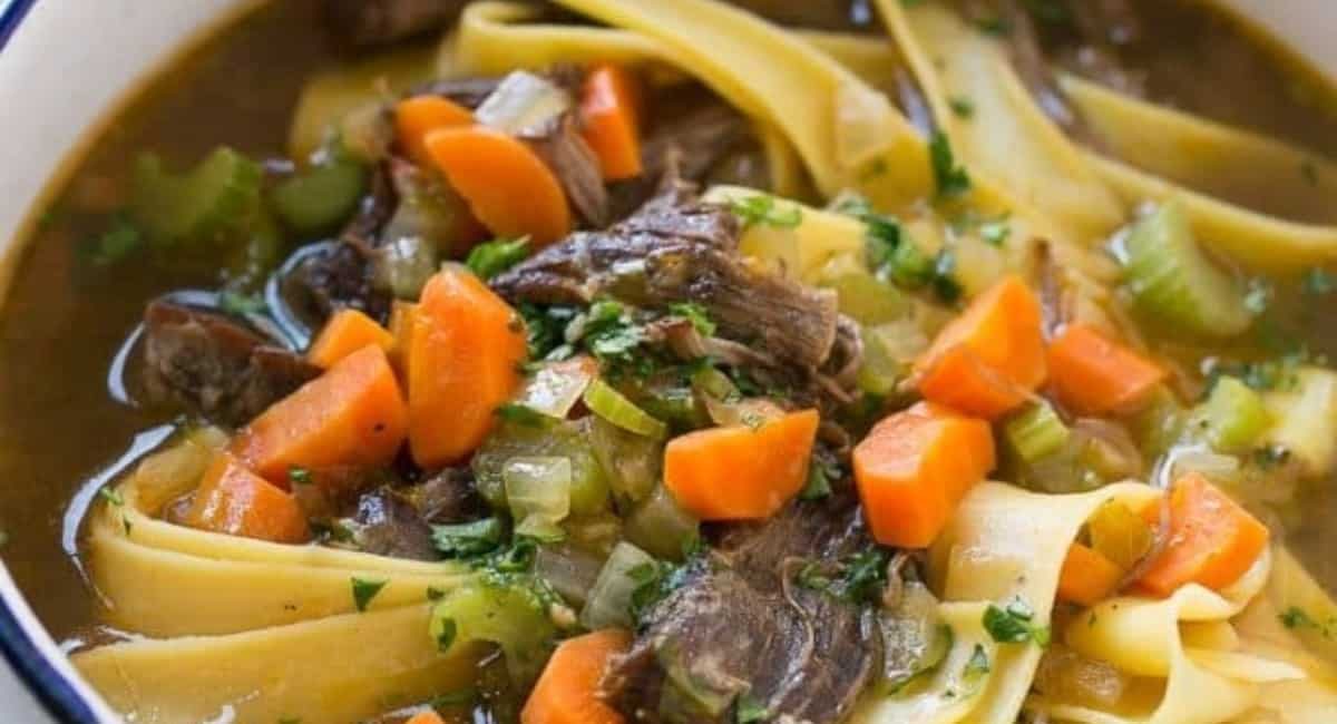 Overhead image of beef noodle soup.
