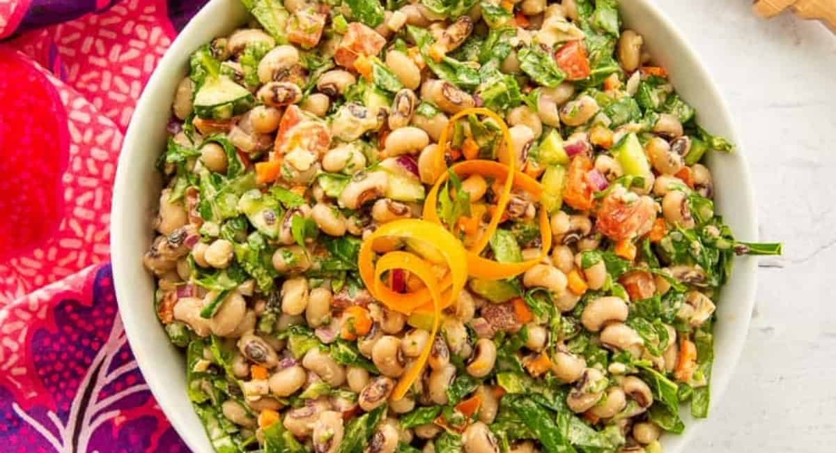Overhead image of black eyed pea salad with collard greens.