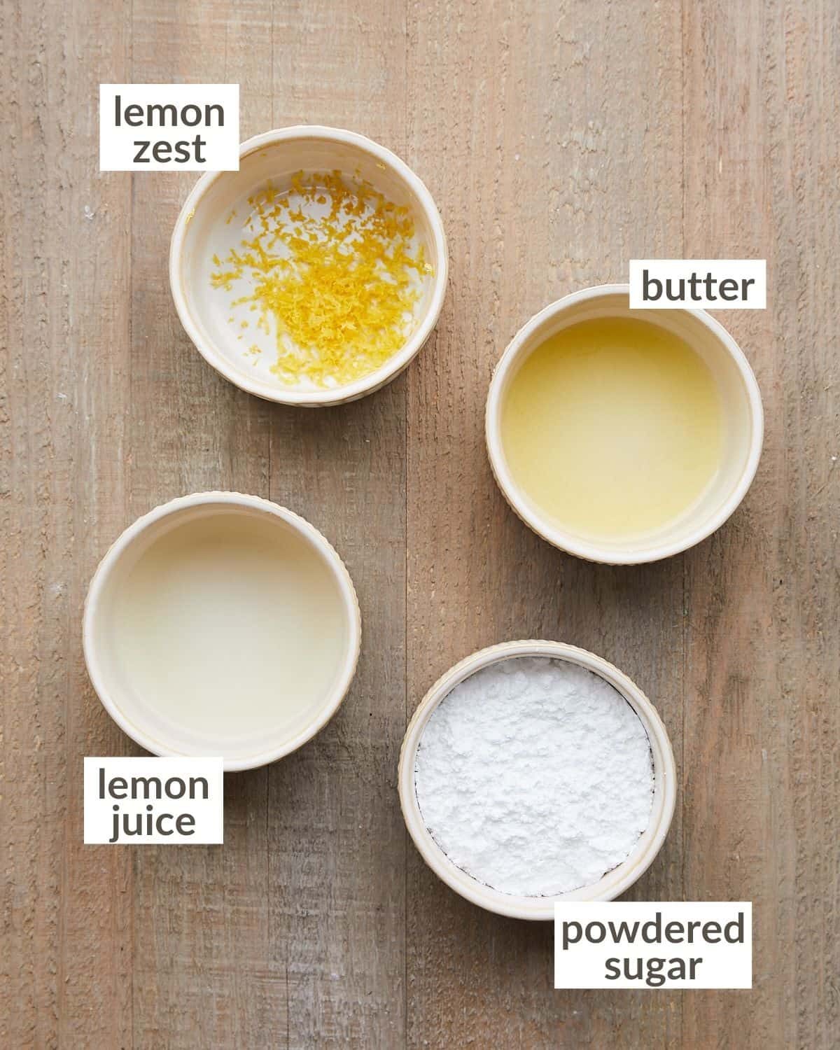 Overhead shot of ingredients in bowls needed to make glaze for blackberry lemon bread.