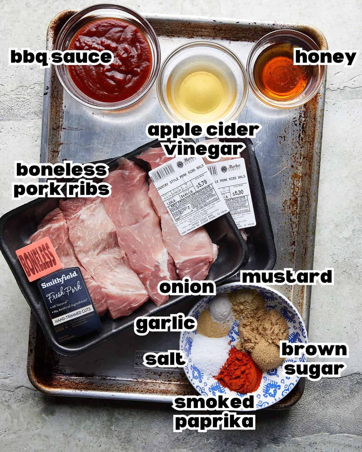 Overhead image of ingredients needed to make boneless pork ribs in the oven.