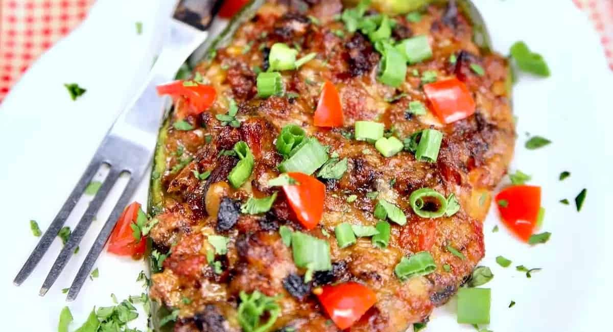 Overhead image of brisket stuffed poblano peppers.