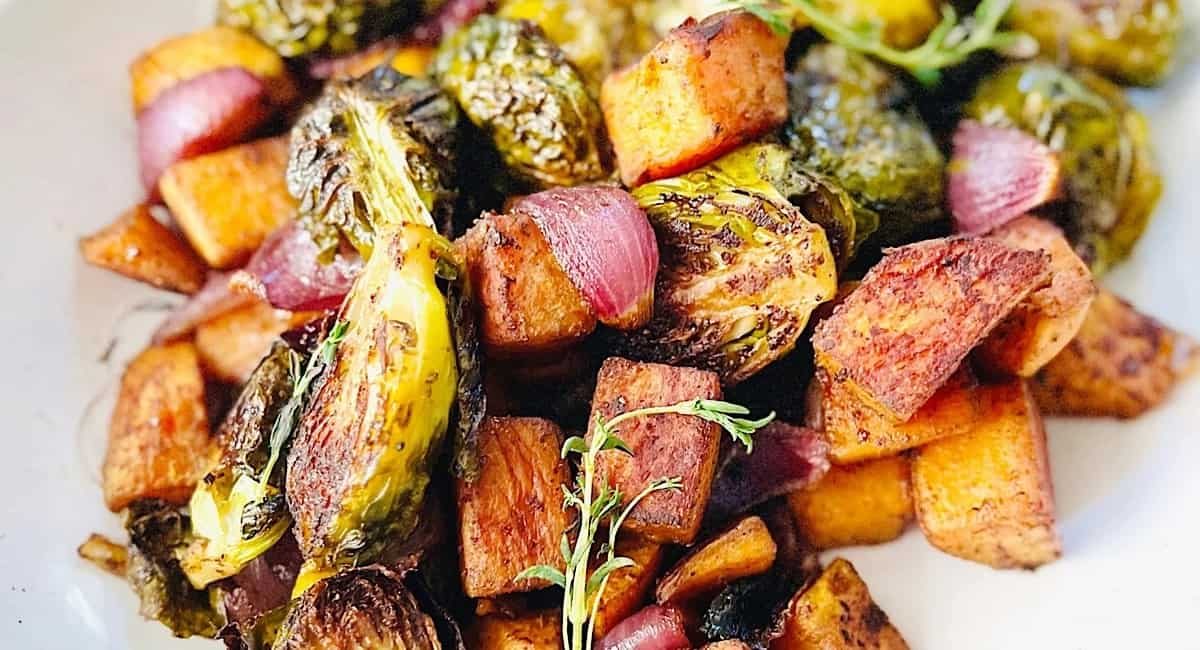 Overhead image of brussels sprout and sweet potatoes.