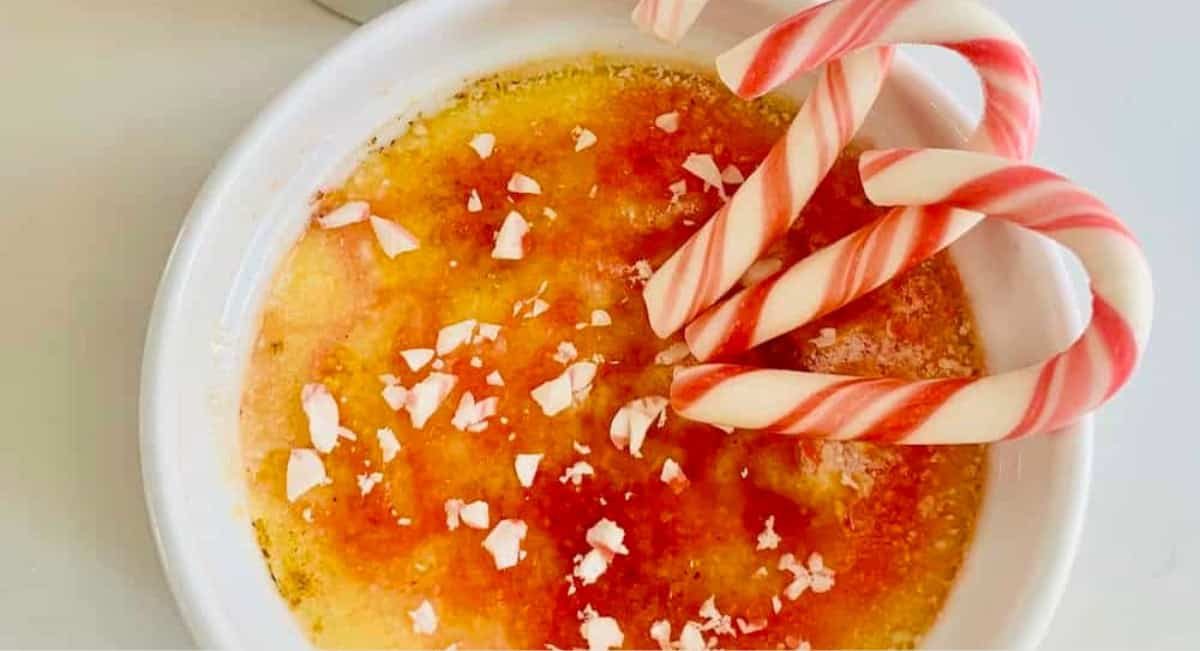 Overhead image of candy cake creme brûlée in white dish.