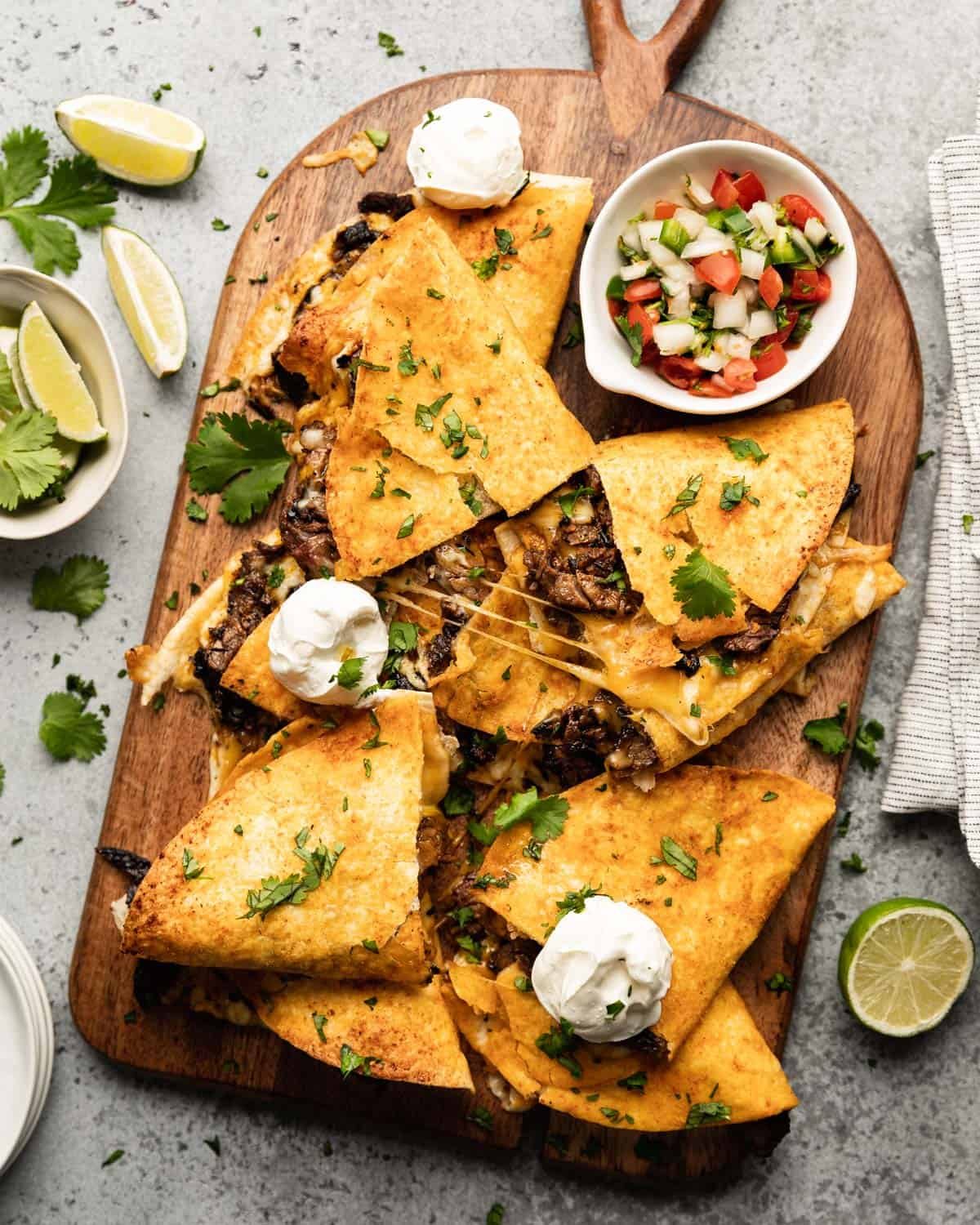 overhead shot of garnished quesadillas