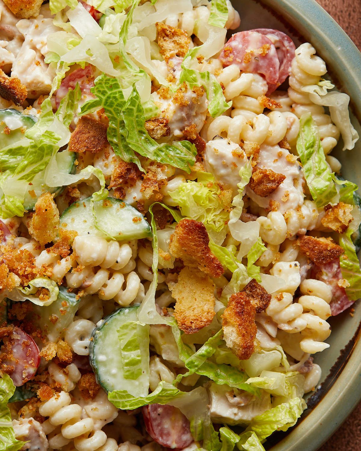 Up close overhead image of chicken caesar pasta salad.