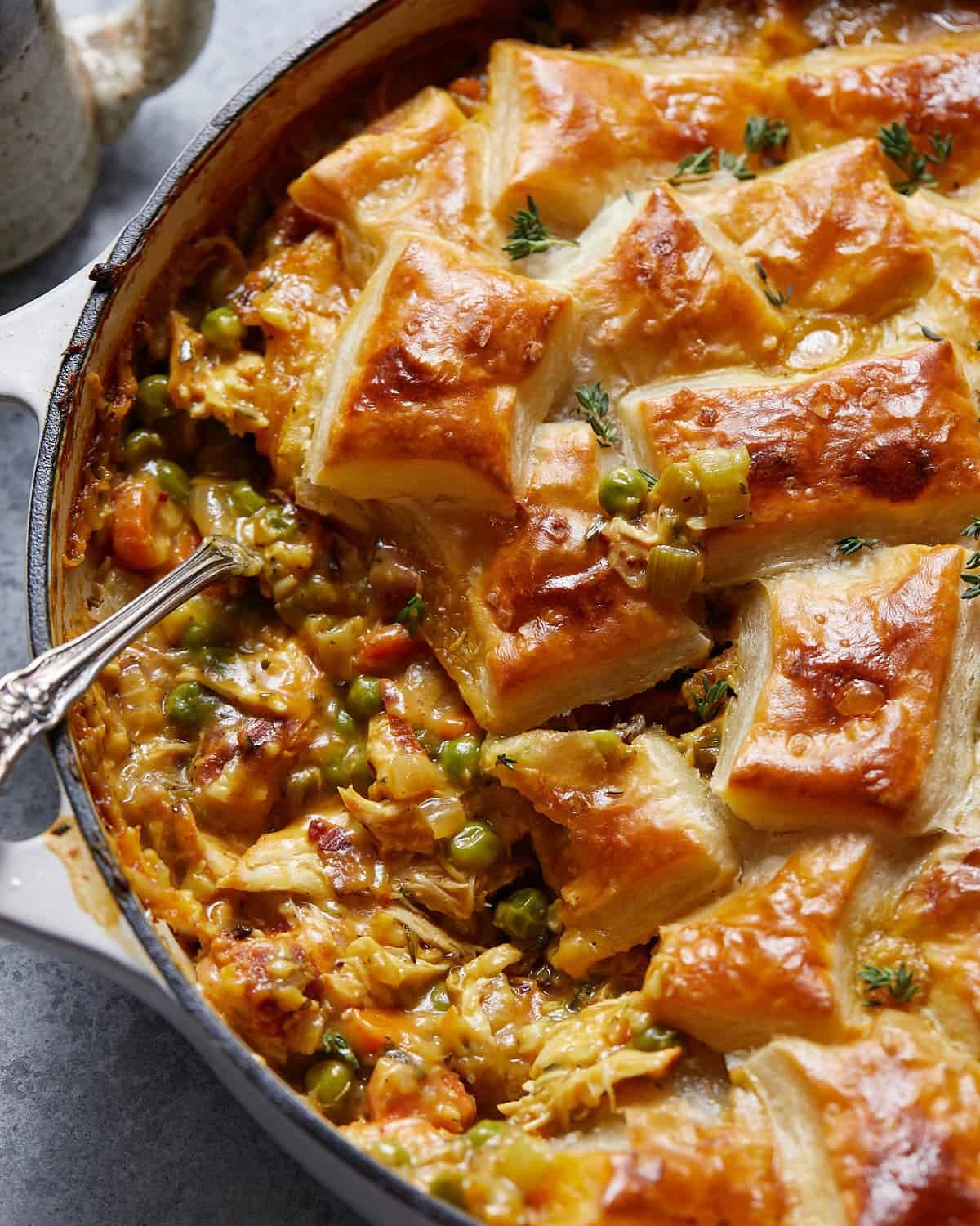 Up close image of chicken pot pie with puff pastry.