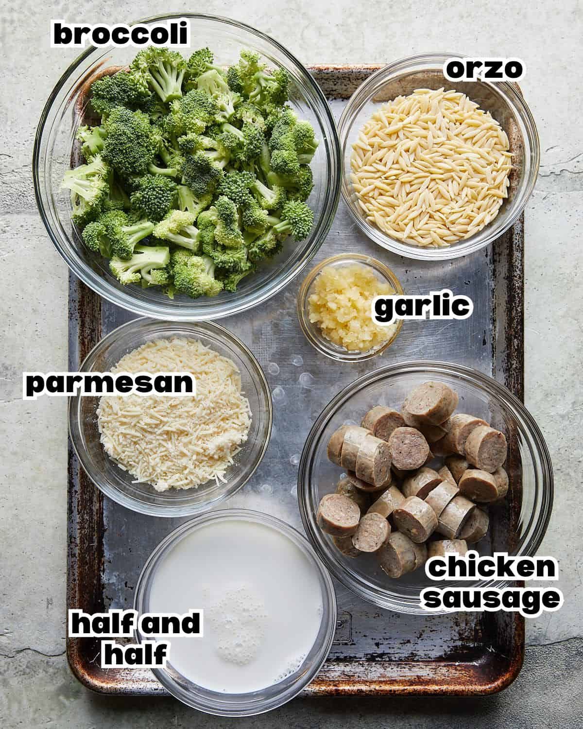 Overhead image of ingredients needed to make chicken sausage orzo.