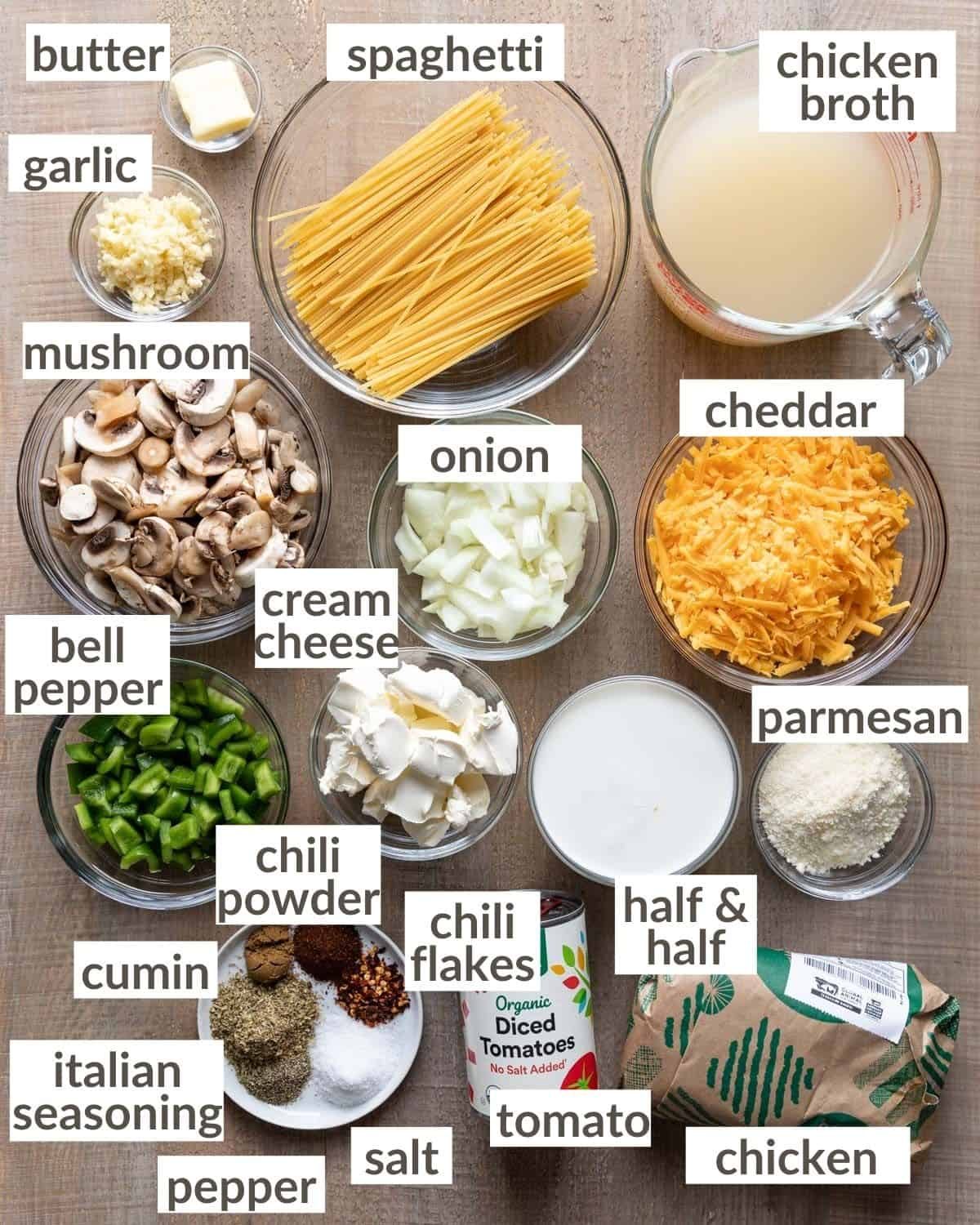 overhead shot of ingredients in glass bowls for instant pot chicken spaghetti