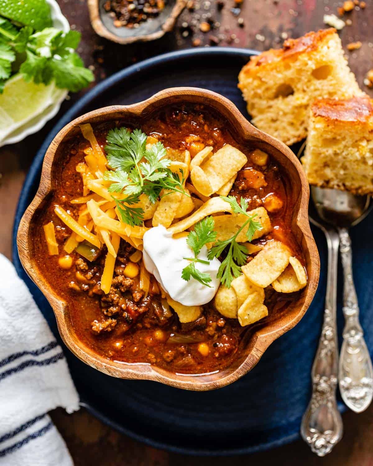 overhead of chili in a wood bowl