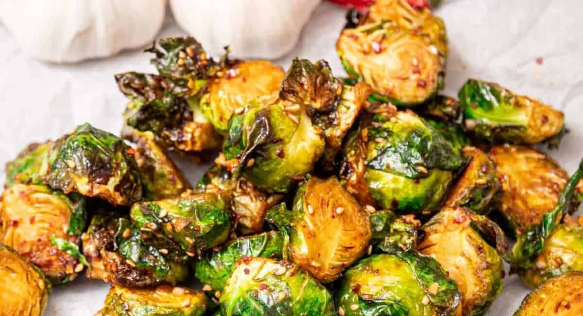 Overhead image of chili garlic sauce brussel sprouts.