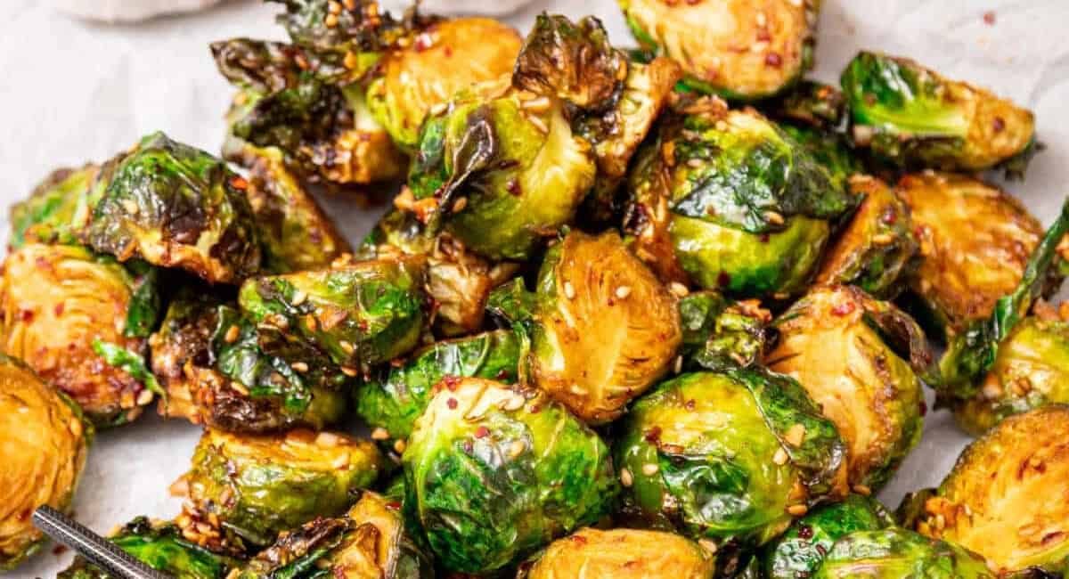 Overhead image of chili garlic sauce brussel sprouts.