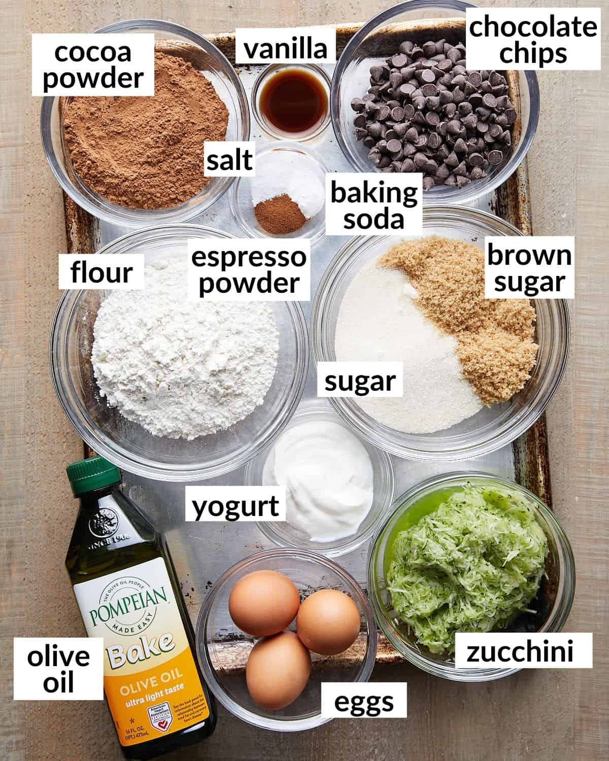 Overhead image of ingredients needed to make chocolate olive oil zucchini bread.