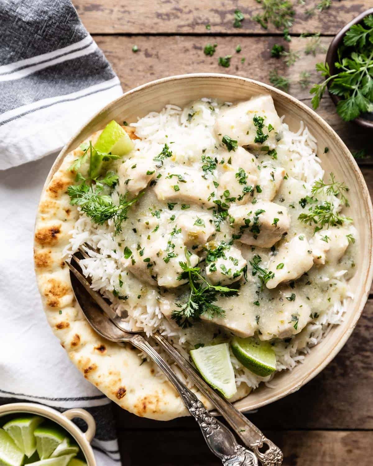 overhead shot instant pot thai coconut lime chicken over rice in a bowl