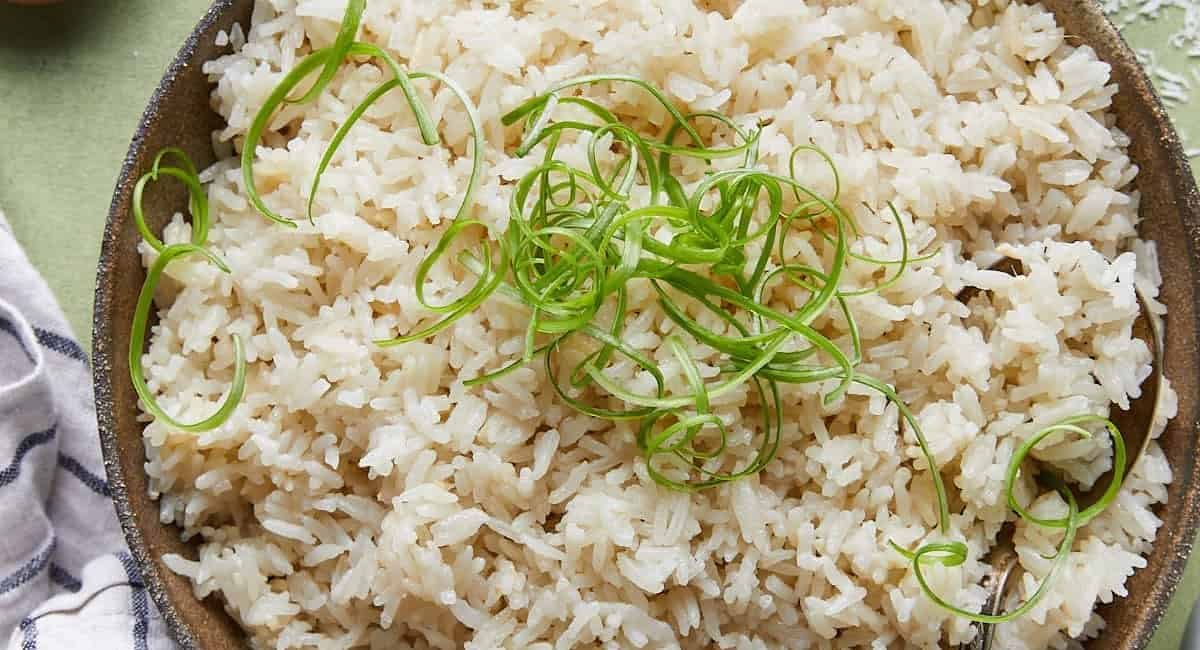 Overhead image of coconut jasmine rice with garnish.