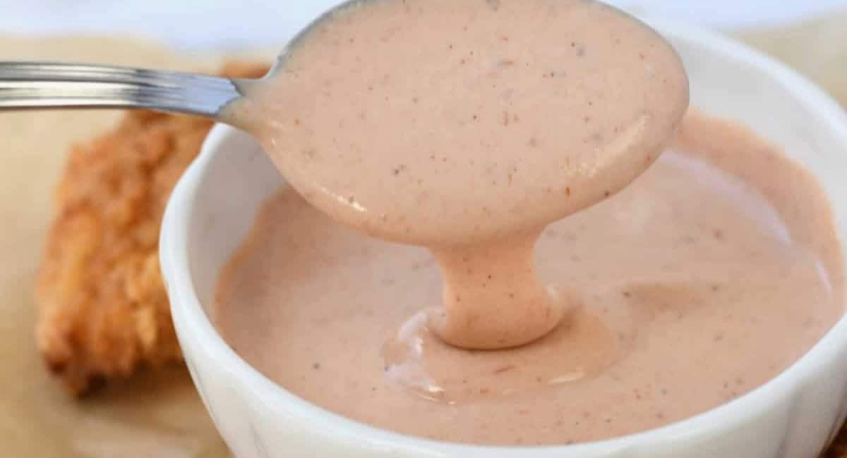 Up close image of comeback sauce recipe in white dish.
